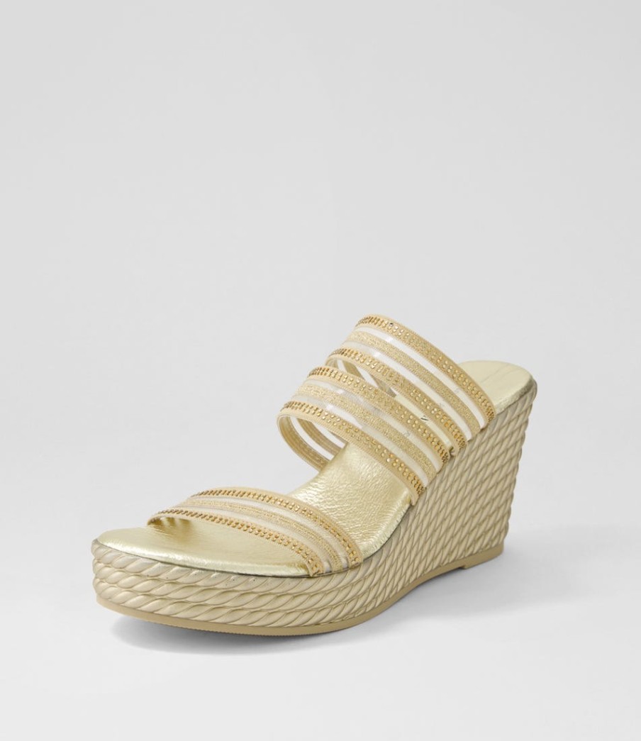 DJANGO & JULIETTE Enrica Gold Vinylite Sandals | Wedges